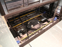 Revolving stage with integrated stage lift in a theatre